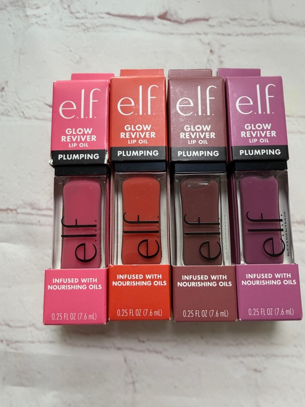Elf Glow Reviver Lip Oil Bundle of 4 new in box